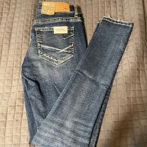 Buckle low rise skinny Jean